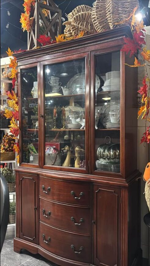 Vintage china cabinet displayed inside Rust & Grain