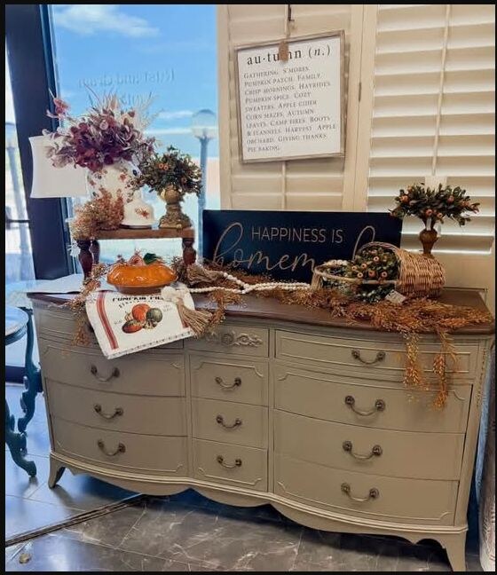 Fall-styled vintage credenza at a 2026 Rust & Grain market